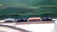 Tankers being pushed back to access filling of last tanker